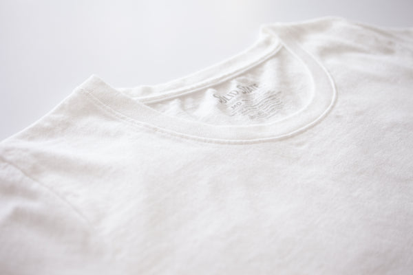 A close up photo of the collar of the American-made Solid State Clothing North Carolina Cotton T-Shirt 