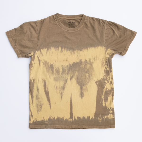An American-made Solid State Clothing t-shirt in natural tie dye color Riverbed on a white background.