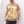 Load image into Gallery viewer, A close up photo of a man wearing an American-made Solid State Clothing t-shirt in natural tie dye color Riverbed.
